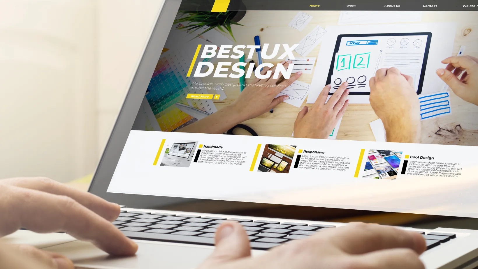 Laptop screen showing a website design layout