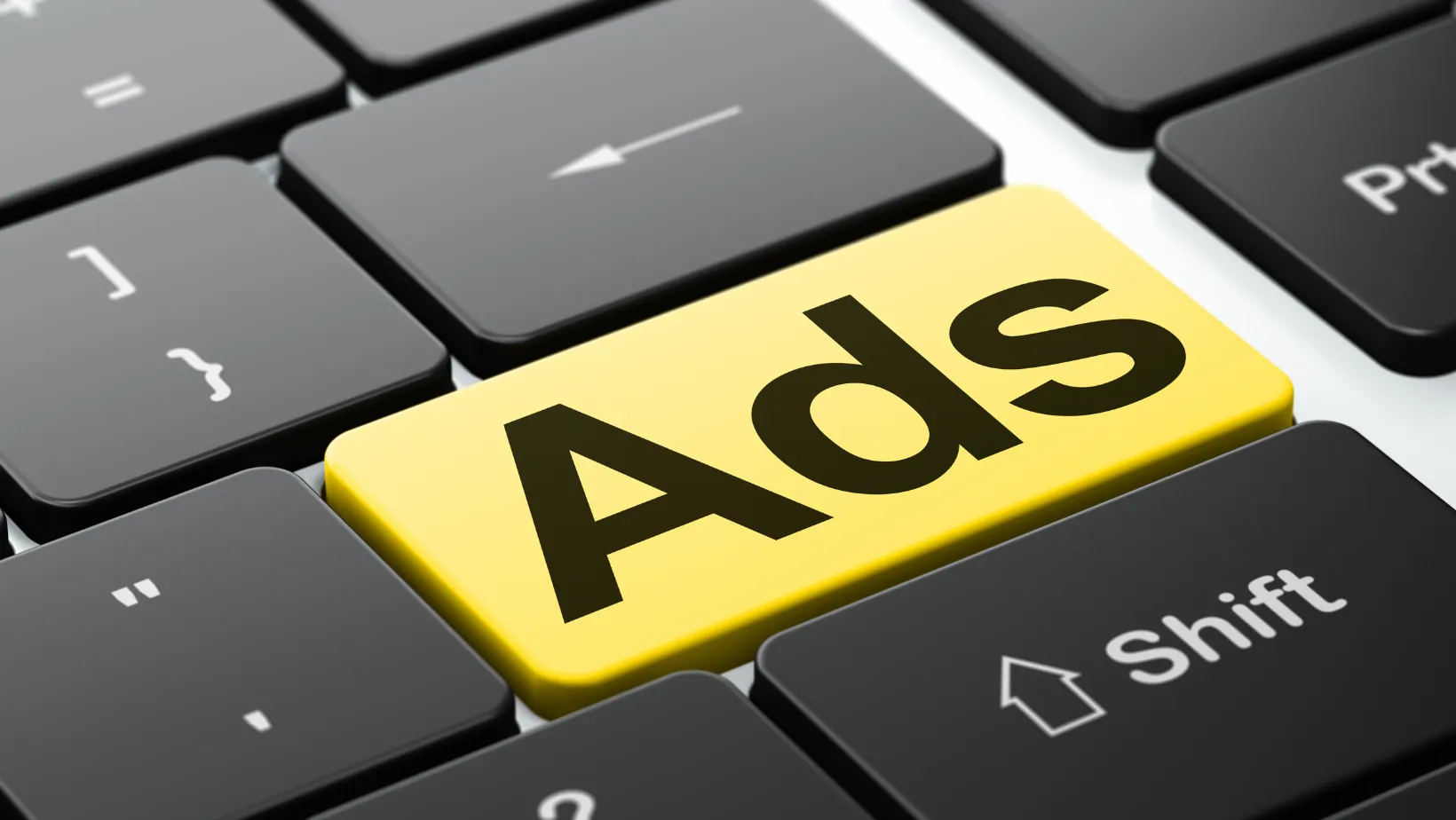 Yellow keyboard key labeled Ads