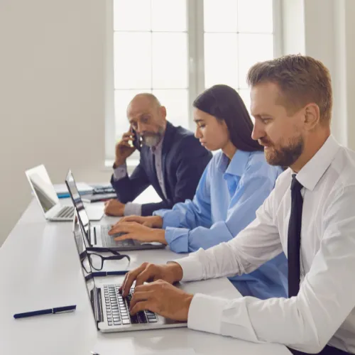 LeadGulls team managing Denver contractor campaigns on laptops