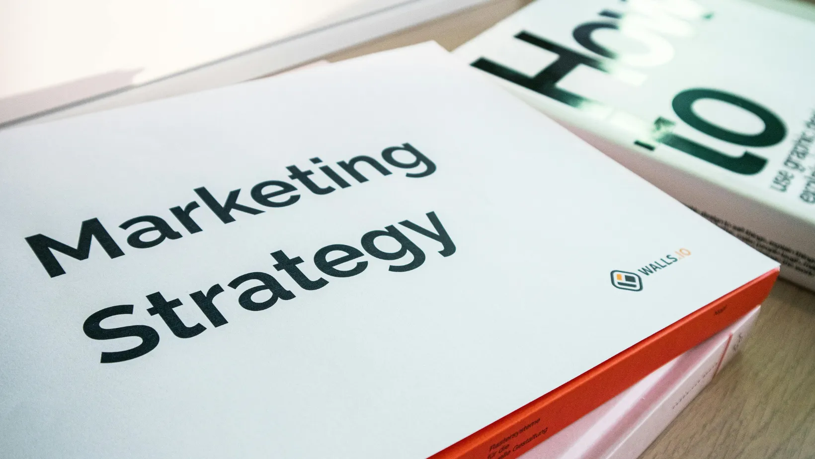 A notebook titled marketing strategy