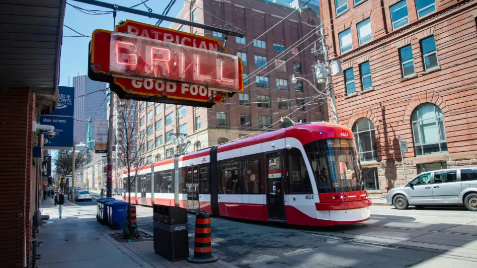 Toronto streetcar passing the Patrician Grill in downtown Toronto