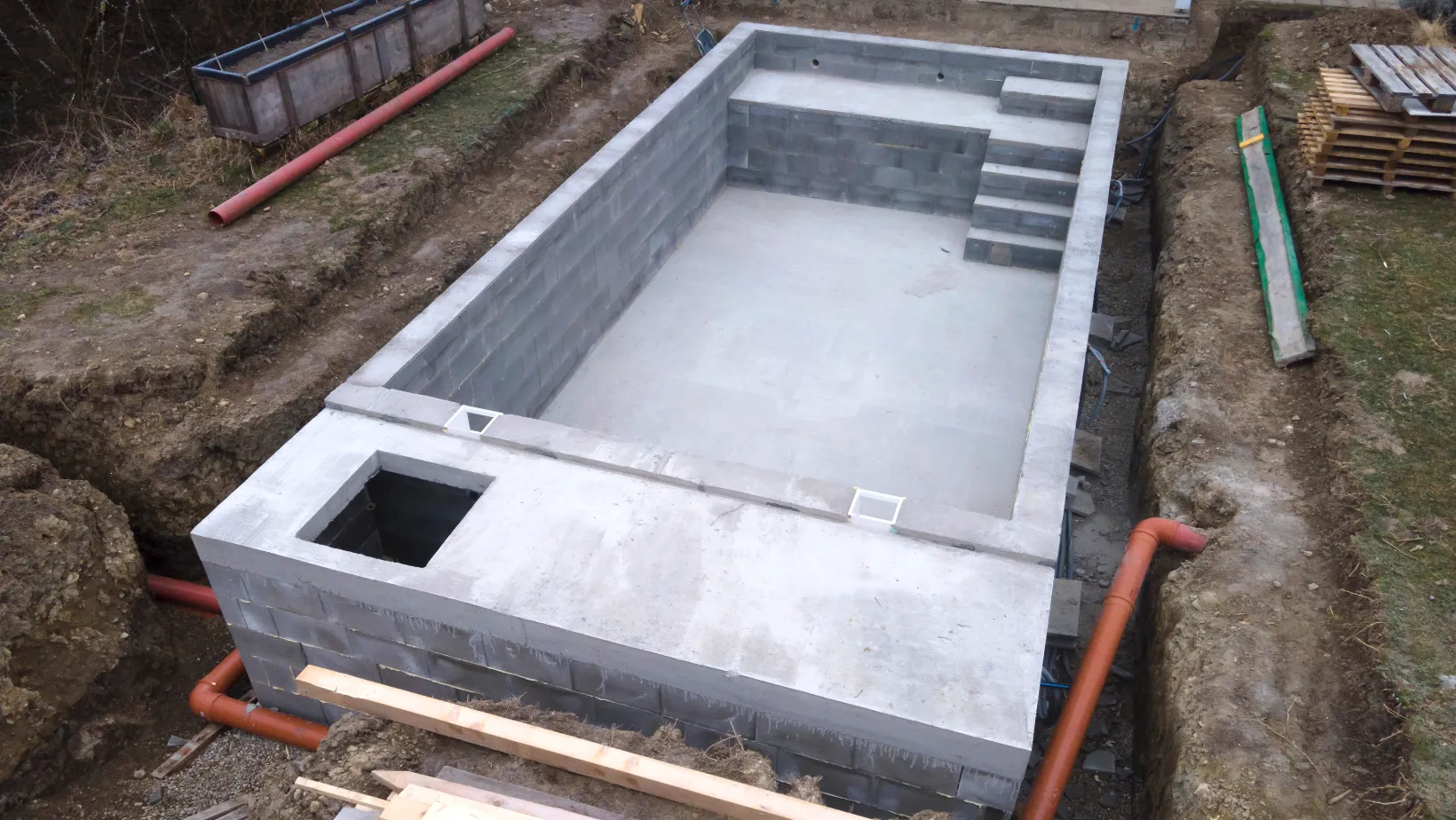 Concrete block pool shell under construction