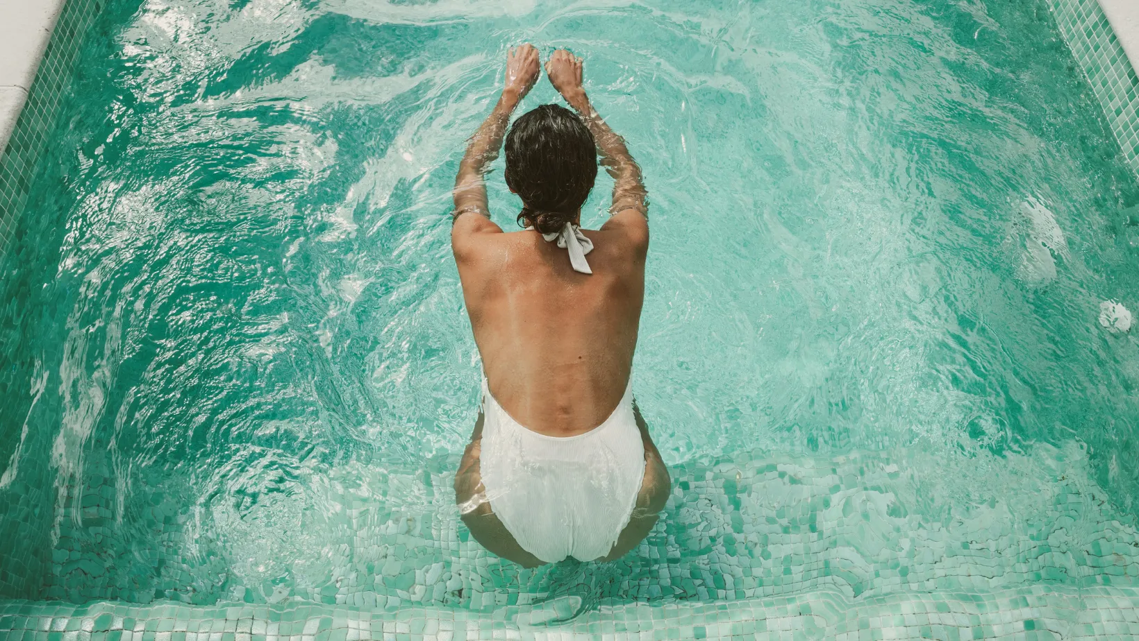 Swimmer in a tiled pool