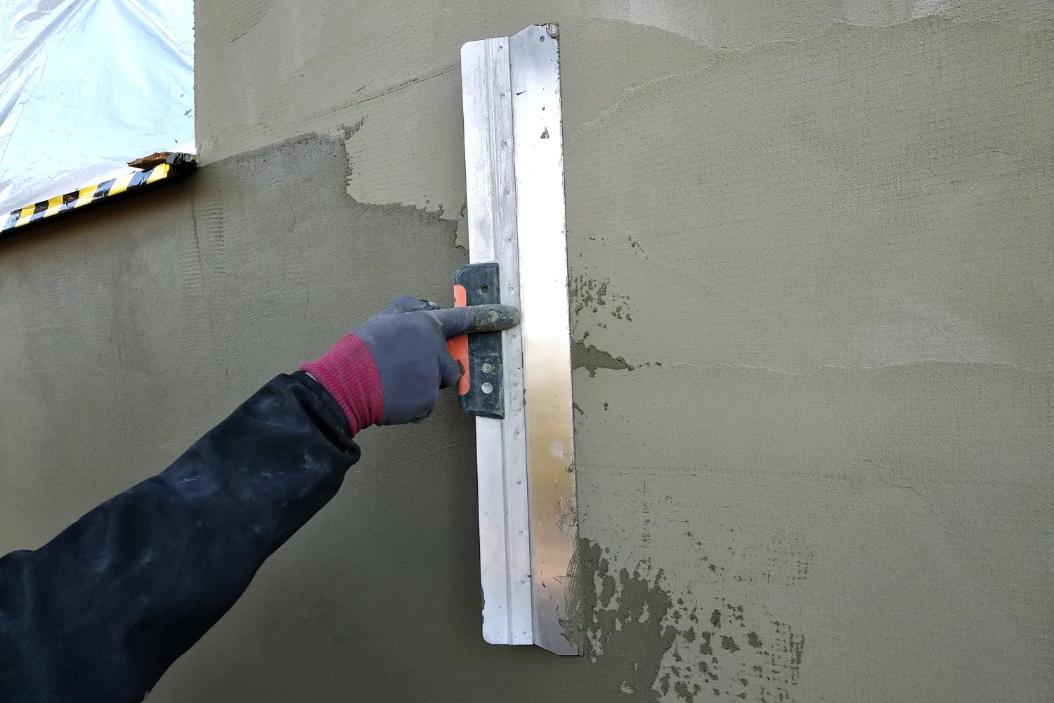 Stucco contractor exterior finish work on a residential property