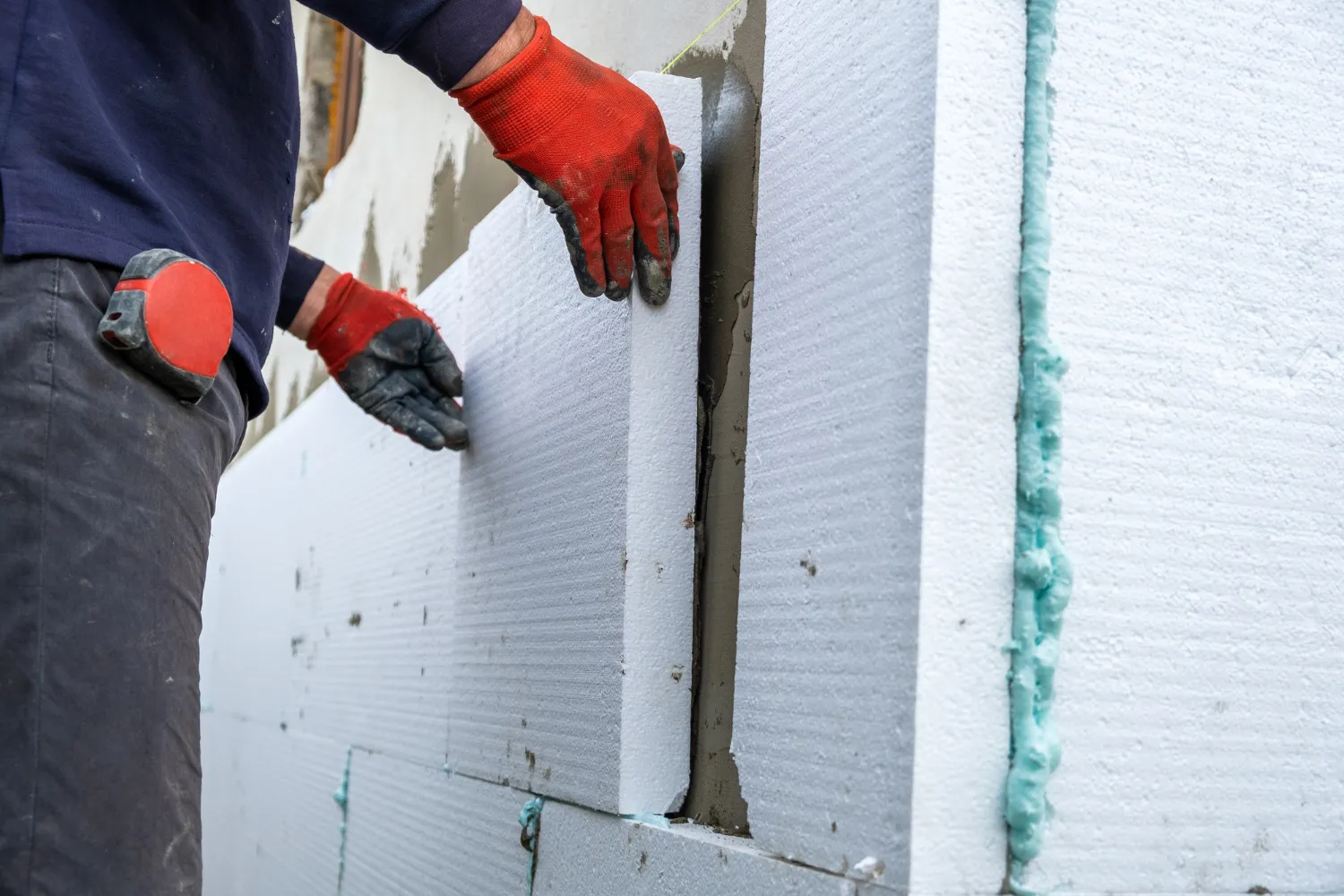 Stucco contractor project site with exterior cladding work in progress