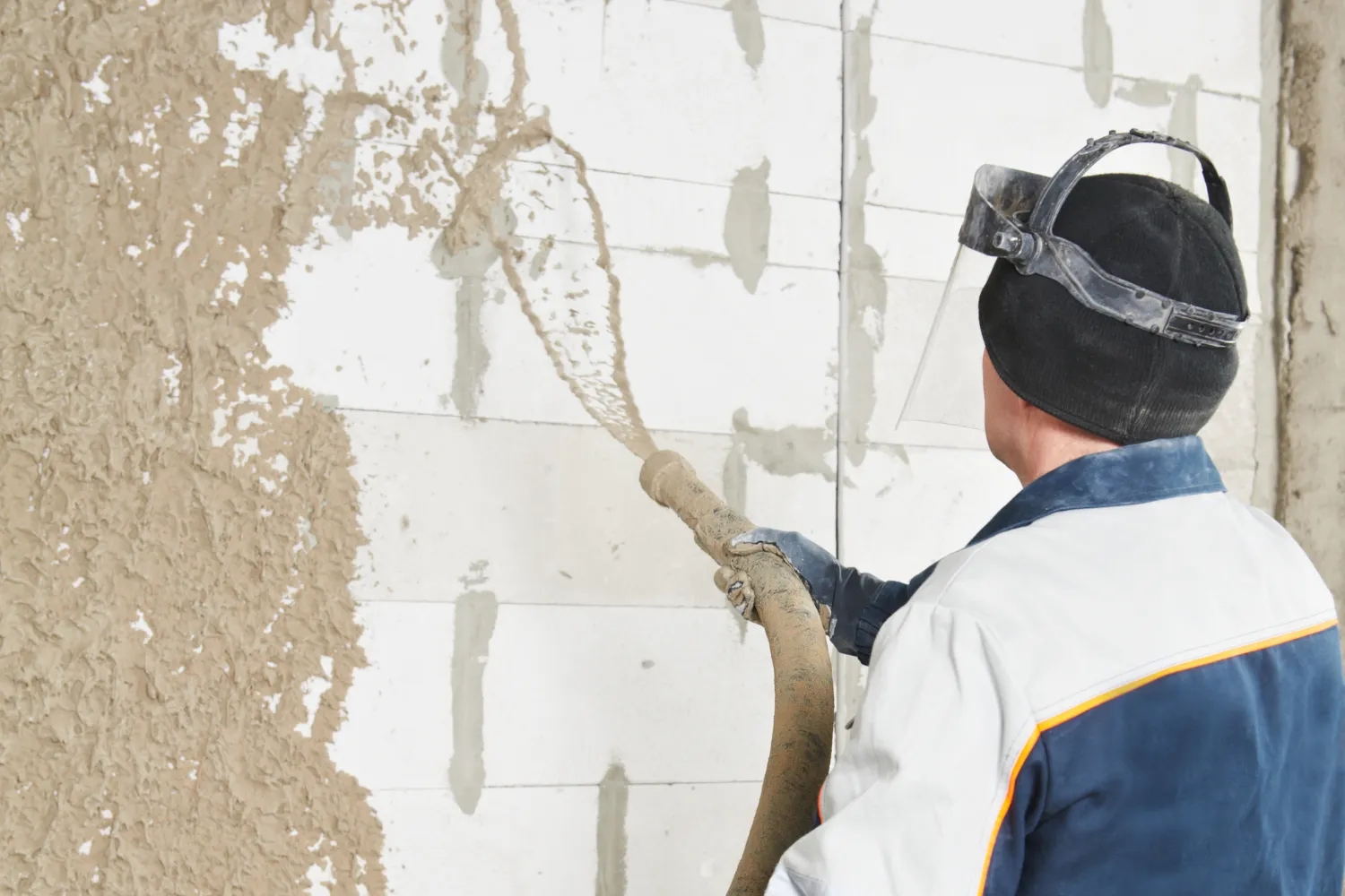 Stucco contractor reviewing digital marketing performance and lead generation results